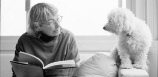 Mary Oliver reading to her dog.